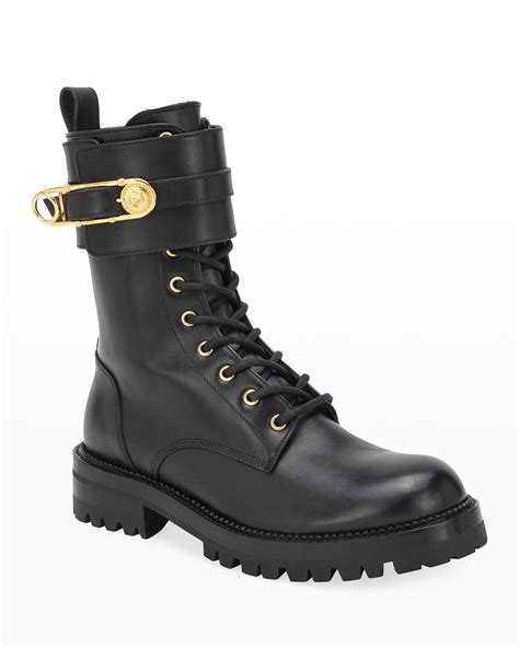 versace safety pin leather boots.